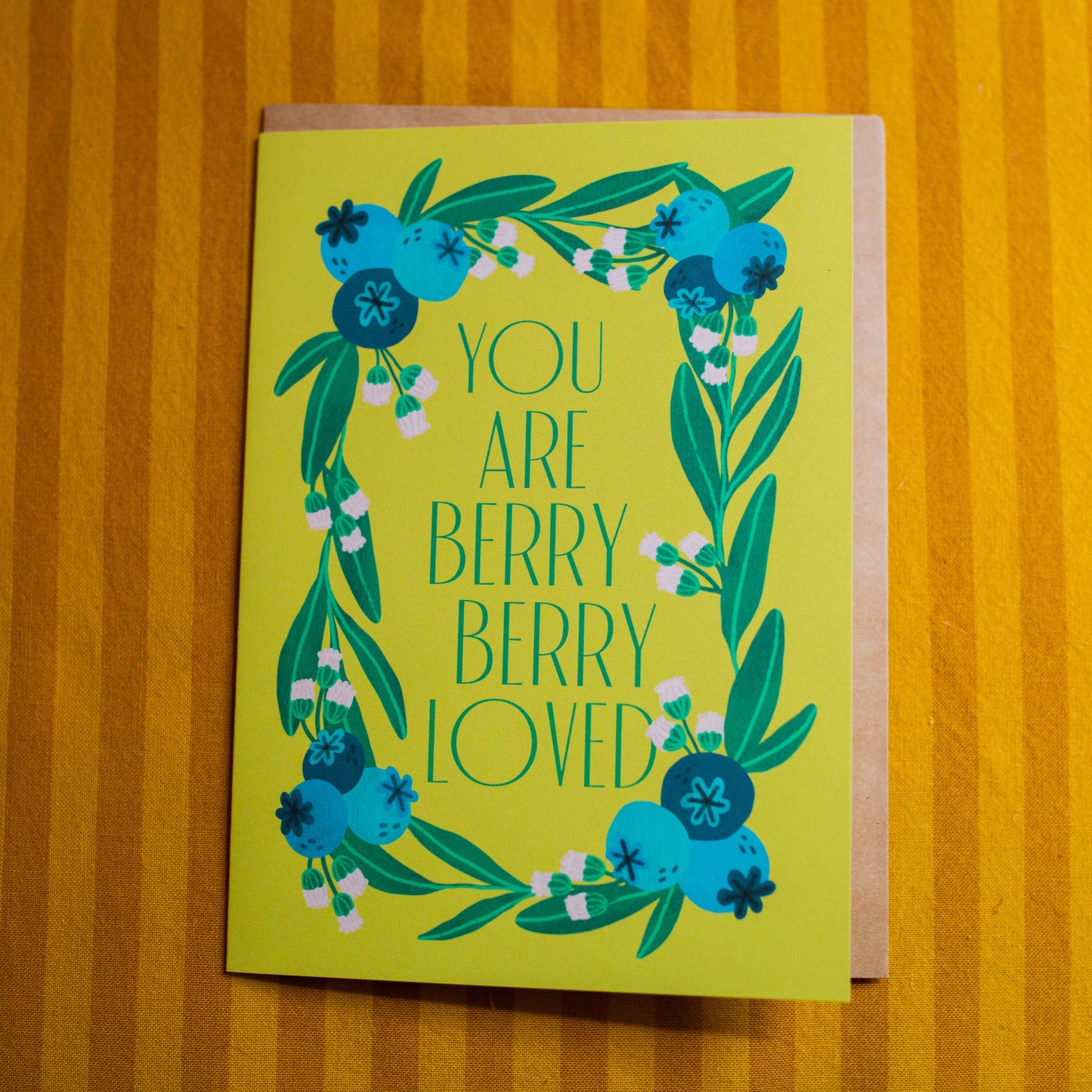 Greeting card with blueberry design and text 