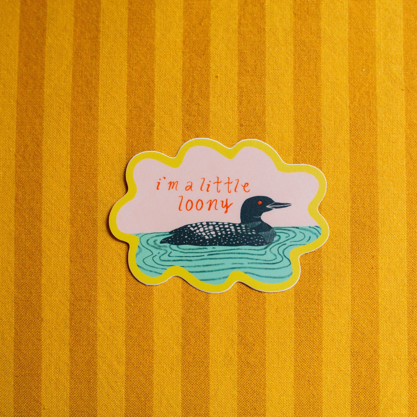 Sticker of a loon that says "I'm A Little Loony"
