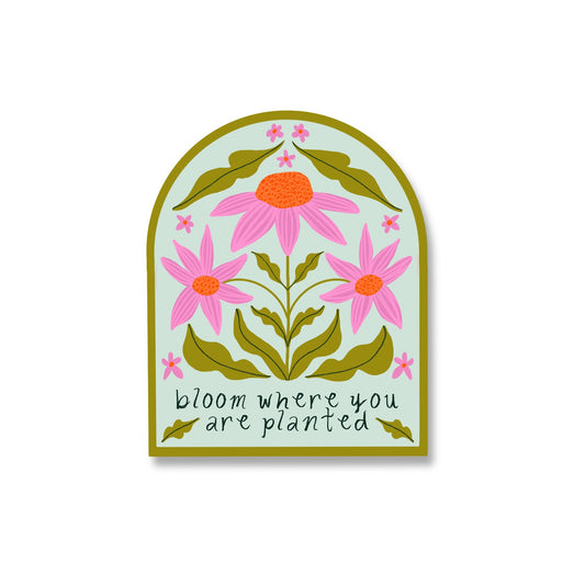 colorful matte vinyl sticker with the phrase "bloom where you are planted" surrounded by floral illustrations with a light blue background
