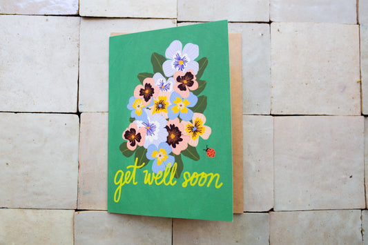 Card with pansies and 'get well soon' text 