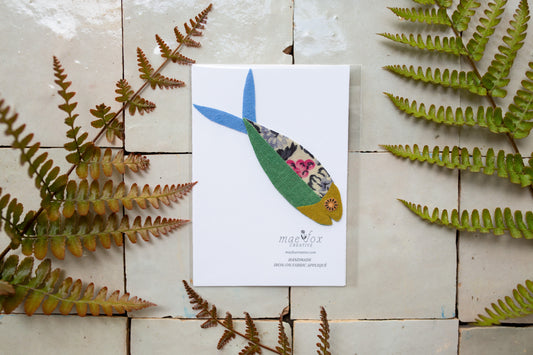 Handmade fish appliqué patch in floral fabric, green, dark green, and blue fabric