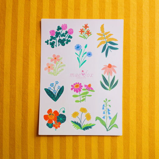 Sticker Sheet with colorful floral illustrations on a yellow striped background